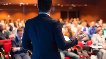 Speaker at Business Conference and Presentation.